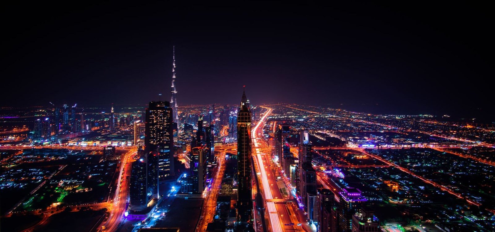 Sheikh Zayed Road and Downtown Dubai from above at night